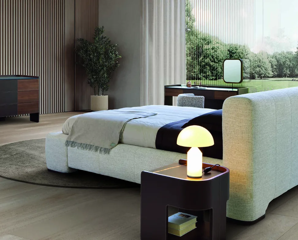 Modern Italian bedroom with an upholstered bed
