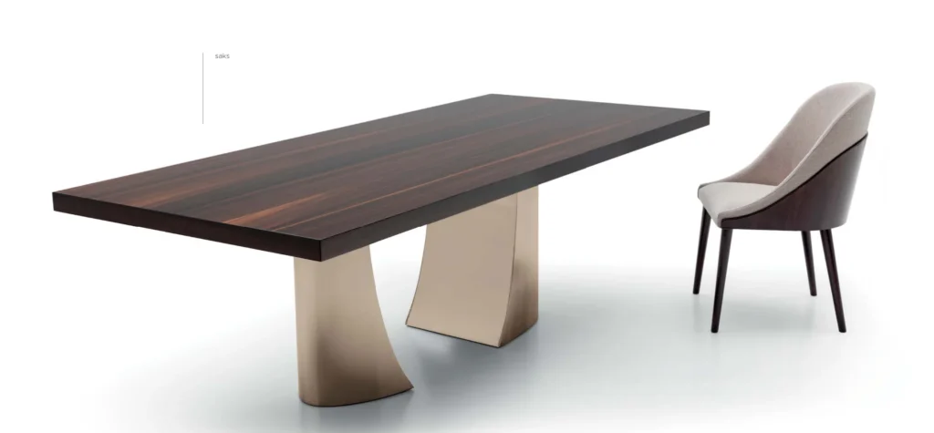 Naurelle Modern catalogue: Saks dining table with a dark wood top and an upholstered chair