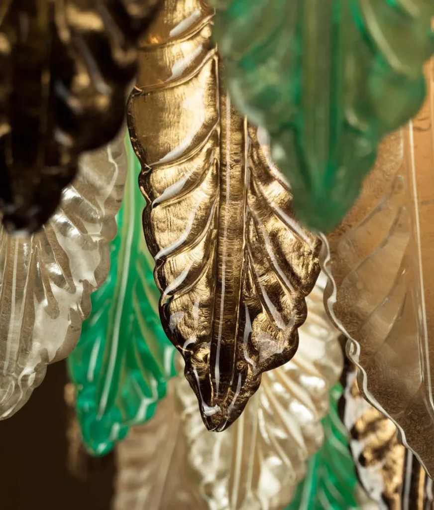 Villari Home Couture: close-up of green and gold Murano glass leaves